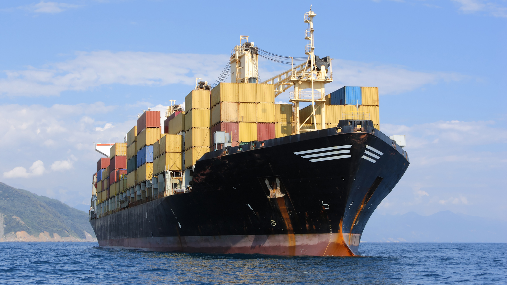Large container ship in mediterranean coast